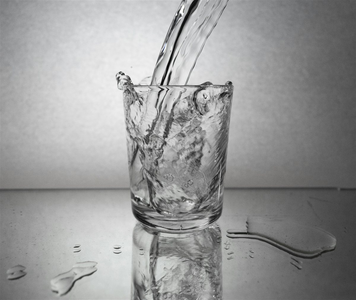 A clear glass of fresh water in natural light