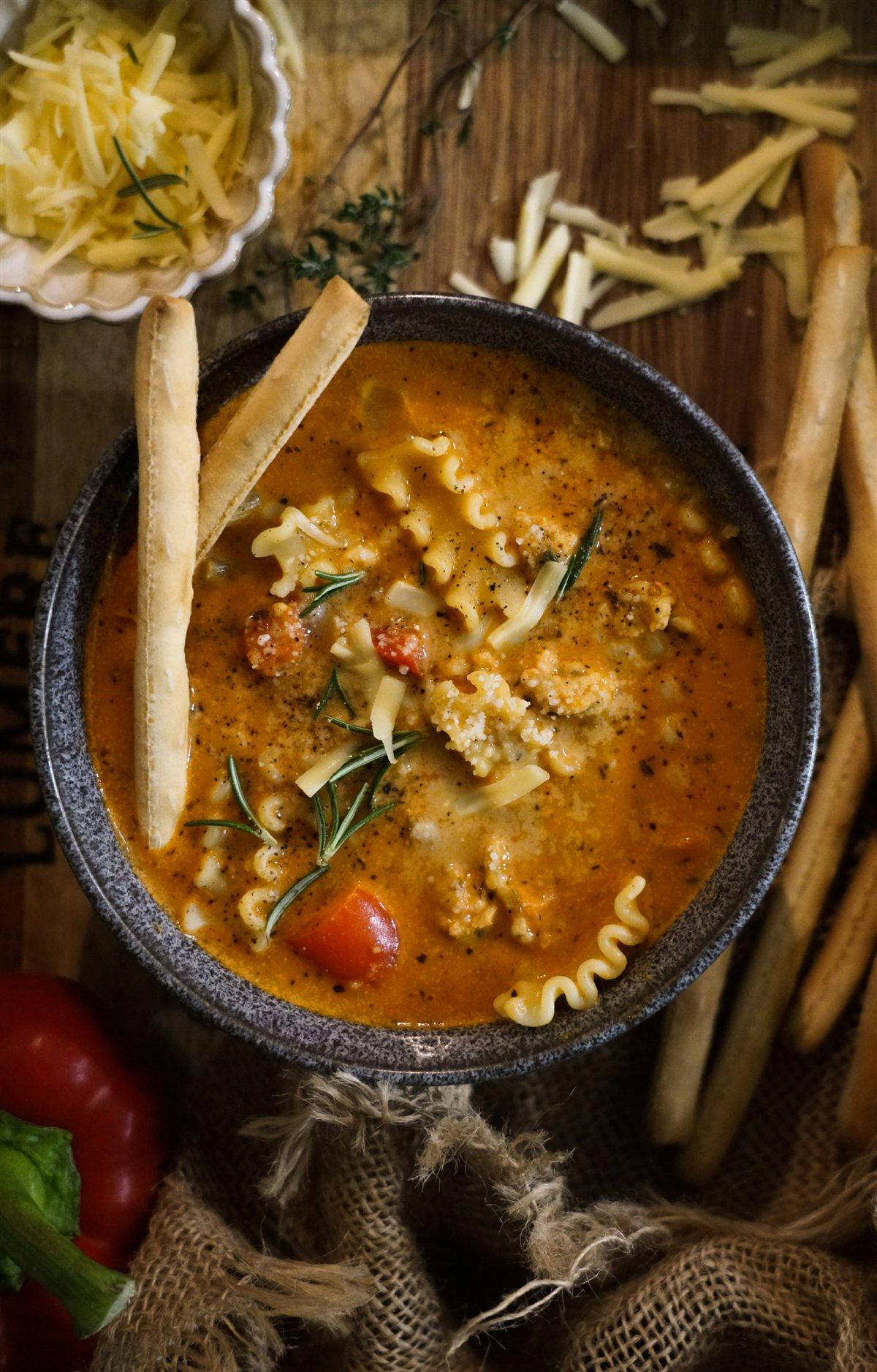 A pot of homemade soup simmering on a stove