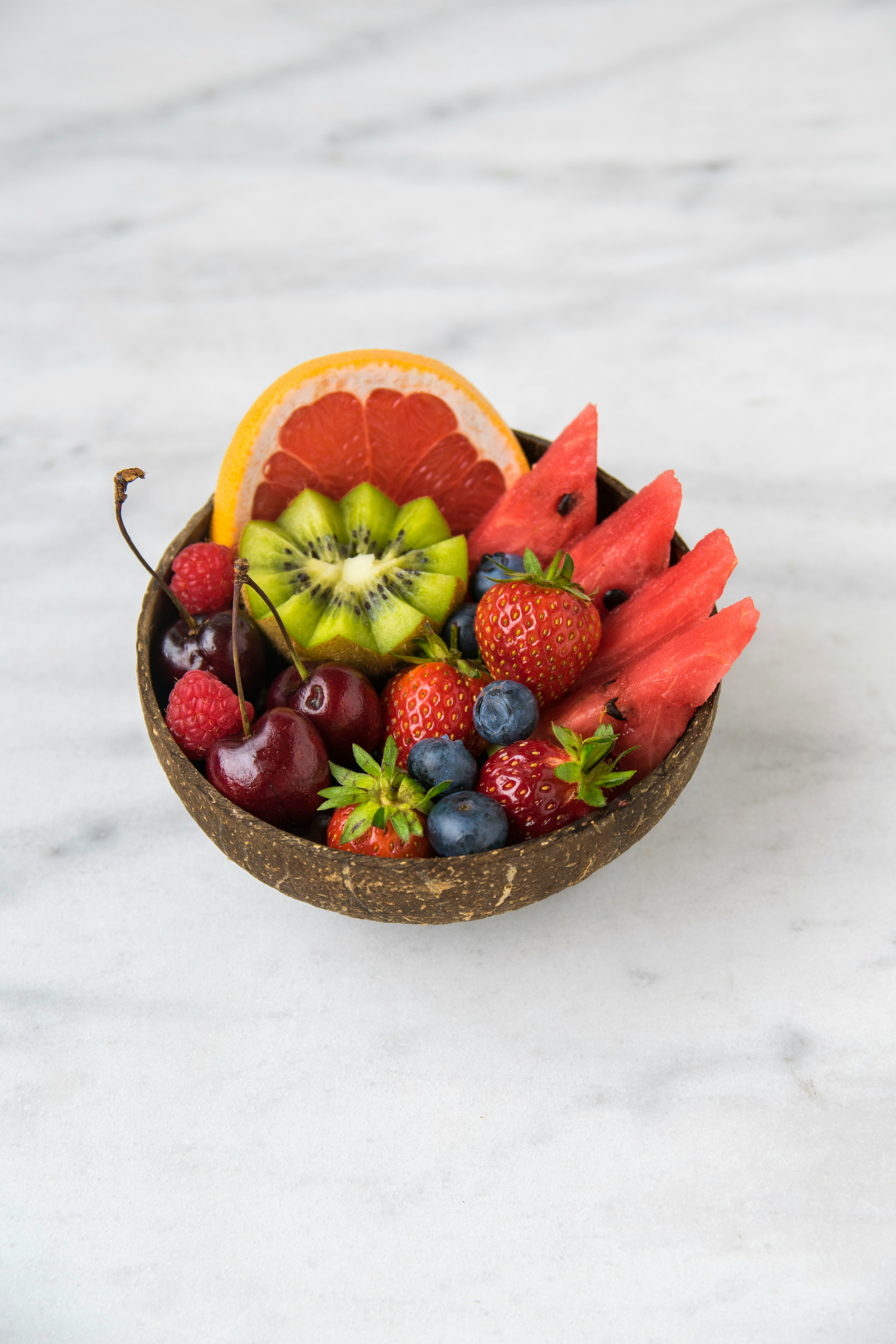 Whole foods and natural ingredients on a wooden surface